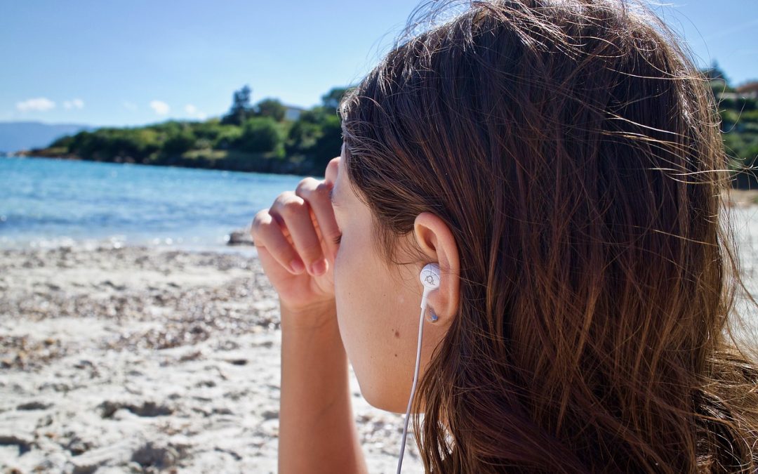 listening to music on the beach
